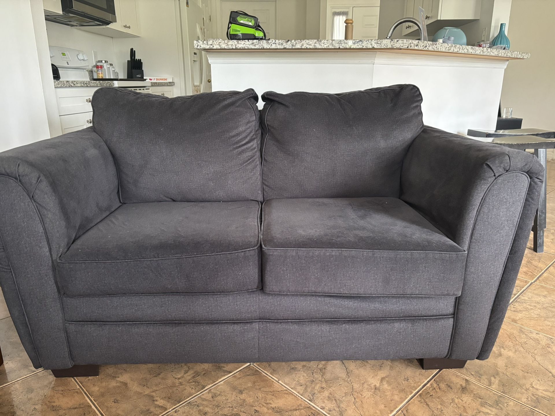 2 gray couches 1 small 1 big