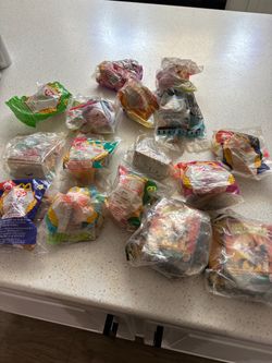 14 McDonald’s Disney toys in package
