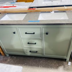 Legion Furniture 54 in. W x 22 in. D Vanity in Pewter Green with Marble Vanity Top in White with White Basin with Backsplash $699