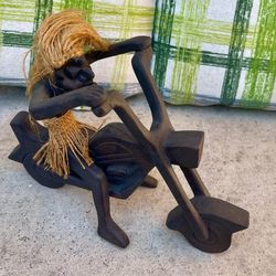 Hand carved wooden tribal motorcycle figurine