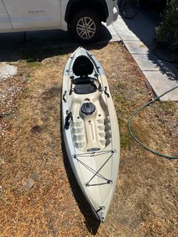 Kayak Lifetime Tamarack Angler with paddle. $350 obo