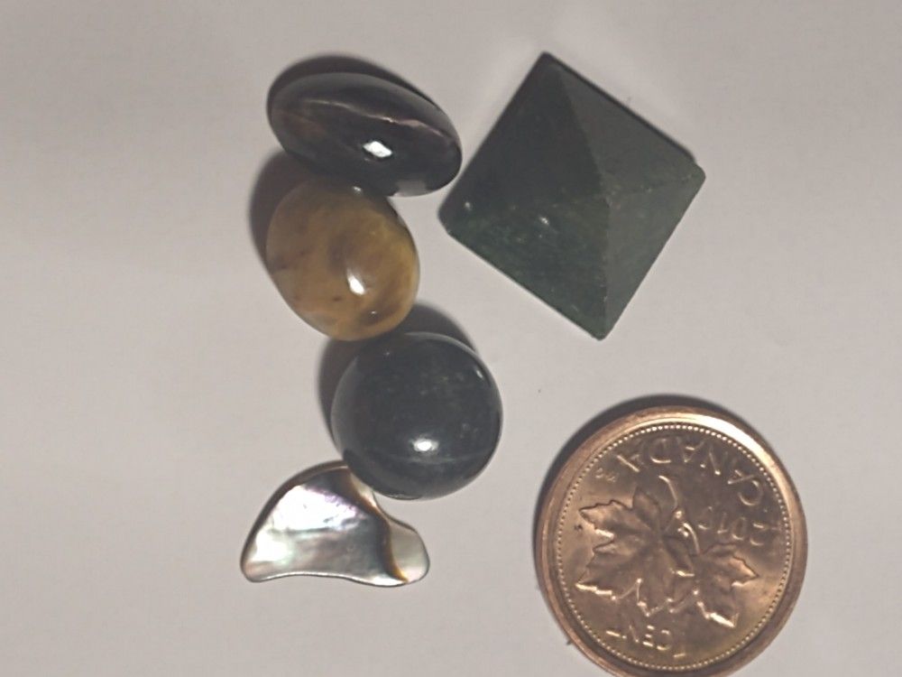 jade, sulemani black cats eye, black star diopside, tiger eye, abalone 