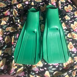 Green swimming flippers