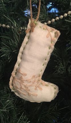 Hand sewn embroidered linen ornament