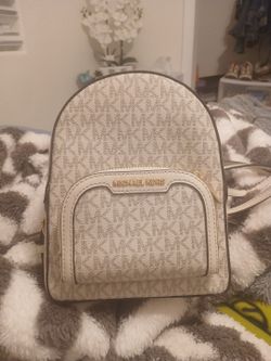 Michael korrs back pack purse