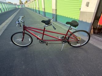 Red Tandem Bicycle for Two Riders