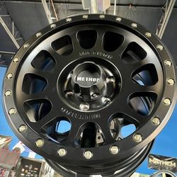 Jeep. 4" Lift Kit 17" Merhod Wheels 37" Tires Installation.