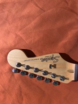 Squire Stratocaster neck ( comes with original tuners btw, not these)