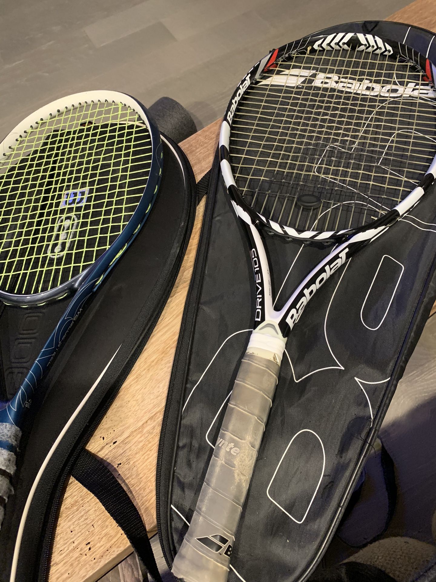 2 Tennis Rackets (Babolat and Wilson)