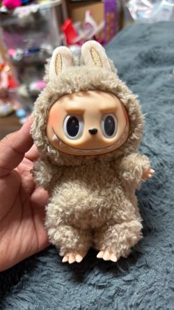 Toffee version from the POP MART The Monsters - Exciting Macarons Vinyl Face Blind Box Series