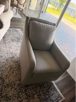Pair of Gray Swivel Arm Chair