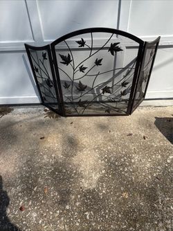 Decorative bronze of fireplace screen