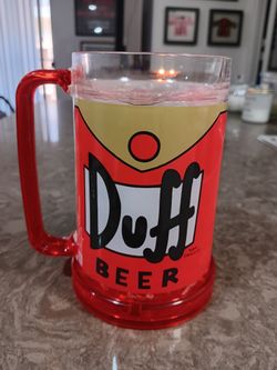 Universal studio's Duff Beer plastic-glass handle 6in 16.oz mug w/ Double-wall construction filled w/ freezable gel Crackle ice keeps drinks cold