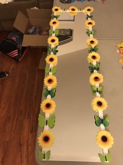 Sunflowers with green butterflies mirror
