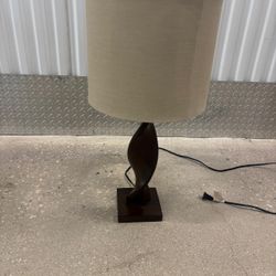 Twirl solid wood base lamp with beige cloth shade.. 26” high… $45