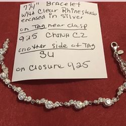 7 1/4” Bracelet clear Rhinestones in silver casing, Tag/ closure925 China CZ,SU,