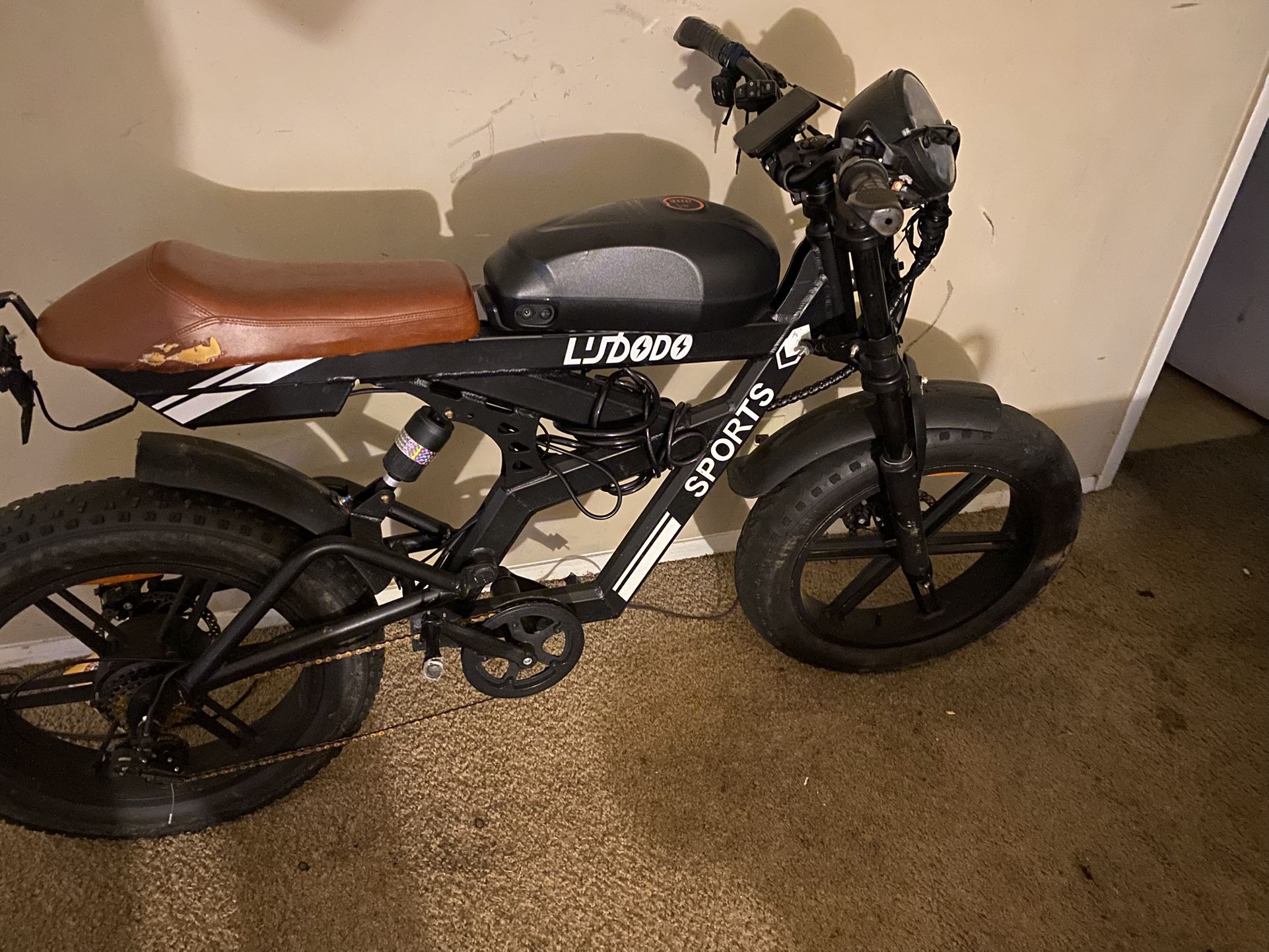 Electric Bike LISDODO" and "SPORTS"