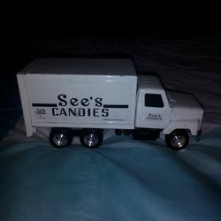 Sees candy metal delivery truck