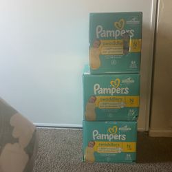 Newborn & Size 1 Pampers 