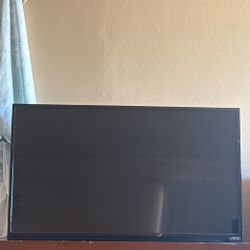 Black Flat Screen Vizo Tv