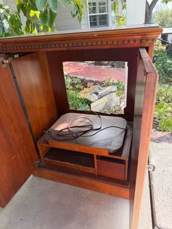 Cabinet.  Old TV.  Good condition could be used for other things.