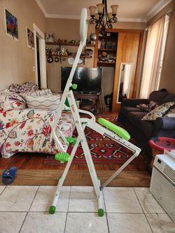 Rowing squat machine