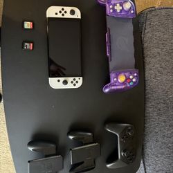 Switch OLED With Clutch Bt Gaming Controller, Pro Controller, 2 Handheld Controllers, And 2 Physical Games, Willing To Sell The Account With Add Games
