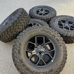 5 2025 Jeep Wrangler Gladiator 17” Black Factory OEM Wheel Rims Falken MT Tires