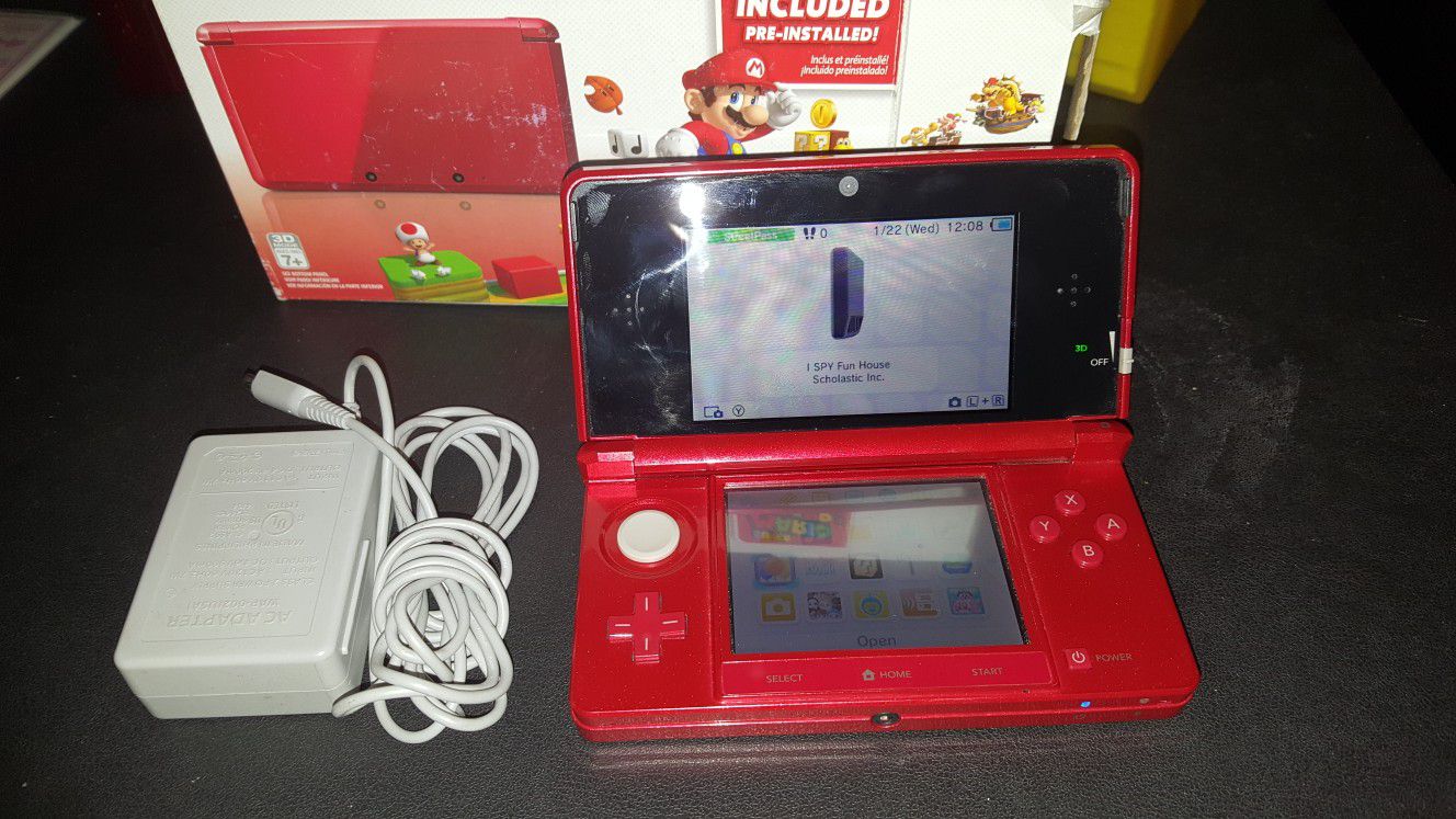 Nintendo 3DS red color with games