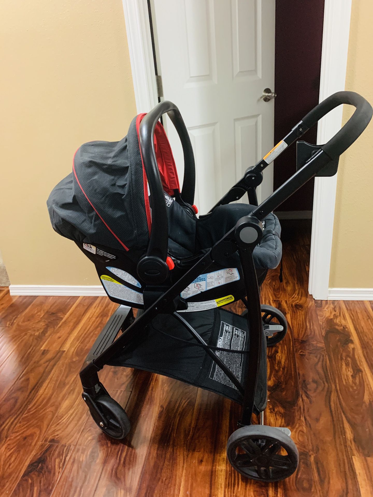 Graco car seat and stroller with two bases