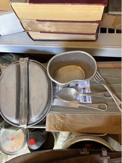 Military metal mess and fork and spoon and knives