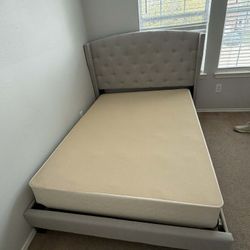 Full Size Grey Upholstered Bed.