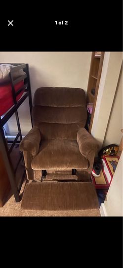 Soft brown recliner with foot res