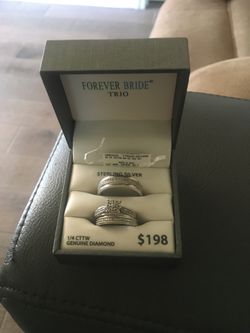 Wedding set of rings, sterling silver 1/4 cttw genuine diamond.