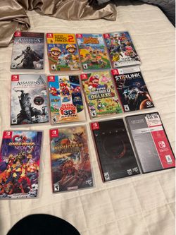 Nintendo switch games box and games lot of 12 games. Mario assassin’s creed and other