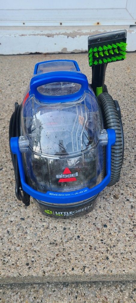 Barelly used Bissell Little Green Pet Pro Bagless Carpet Cleaner 5.7 amps Standard Multicolored