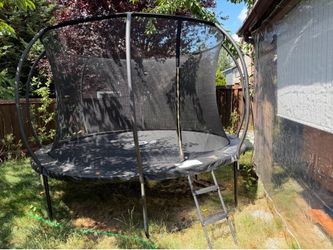 Outdoor Trampoline with Net - 12 ft, excellent condition