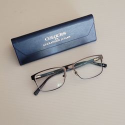 Colours by Alexander Julian RAMEAU Grey Eyeglasses Frame 55-17-145 W/ Case.
Frame only. You need your own lenses.
Frame and case in very good sh