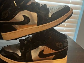 Silver and black Jordan 1s