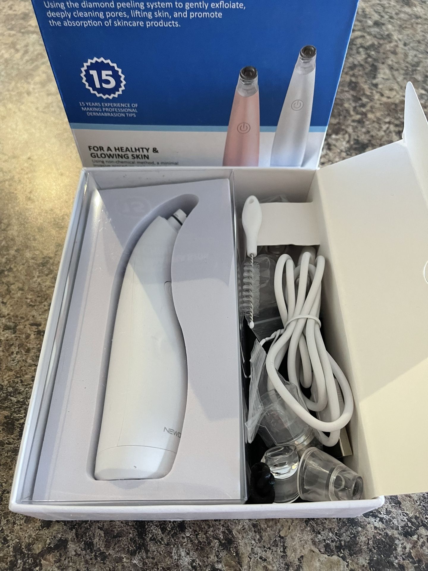 New in the box microdermabrasion machine. $20