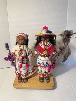 Pair Rubber Soft Vinyl Latin American Dolls In Full Costumes Mounted On WD Base 