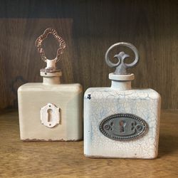 Two Glass Decorative Jars