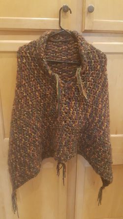 Hand knitted poncho