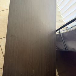 Brown coffee table with collapsible top