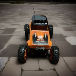 Rock Crawler Remote Control Off-Road Truck  Orange/Black needs new batteries