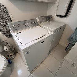 Maite brand washing machine and dryer.