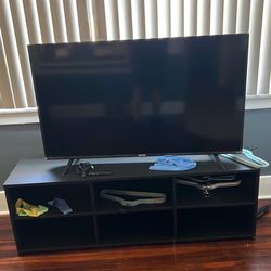 55 inch Roku TV with stand