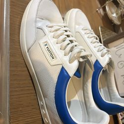 authentic Louis Vuitton Luxembourg sneakers featuring a white technical mesh upper, leather detailing, and blue accents