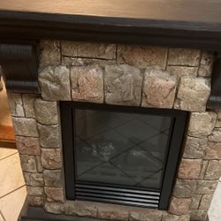 An electric fireplace brand new never used