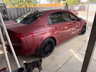 Acura TL Sedan – Red with Black Wheels